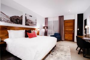 Postel nebo postele na pokoji v ubytování HOTEL MINA REAL MATEHUALA + 32 fotografií