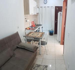 Kuchyň nebo kuchyňský kout v ubytování Apartamento próximo ao Aeroporto de Florianópolis.