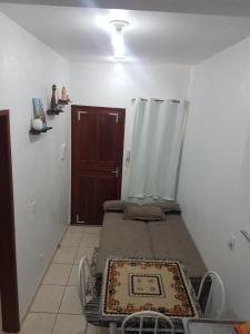 Postel nebo postele na pokoji v ubytování Apartamento próximo ao Aeroporto de Florianópolis.