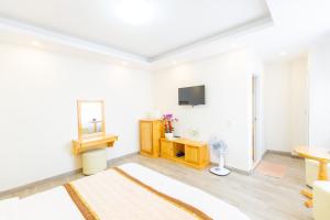 TV a/nebo společenská místnost v ubytování The Grace Hotel