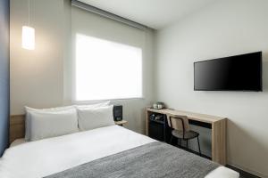 Televiisor ja/või meelelahutuskeskus majutusasutuses M's Hotel Kyoto Station Kasuga