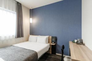 Voodi või voodid majutusasutuse M's Hotel Kyoto Station Kasuga toas