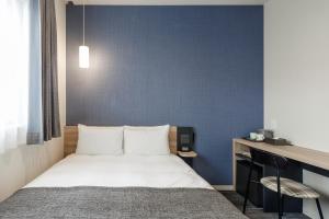 Voodi või voodid majutusasutuse M's Hotel Kyoto Station Kasuga toas