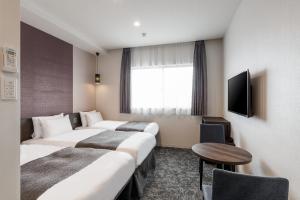 Voodi või voodid majutusasutuse M's Hotel Kyoto Station Kasuga toas