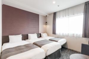 Voodi või voodid majutusasutuse M's Hotel Kyoto Station Kasuga toas