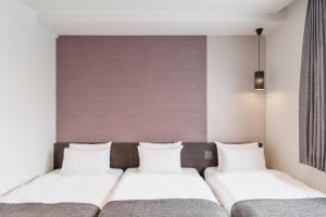 Voodi või voodid majutusasutuse M's Hotel Kyoto Station Kasuga toas