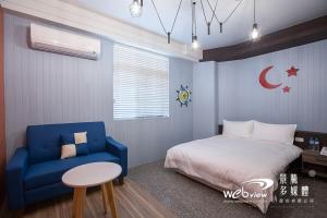 Postel nebo postele na pokoji v ubytování FDBK Homestay