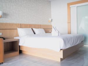 Postel nebo postele na pokoji v ubytování Luxe Villa