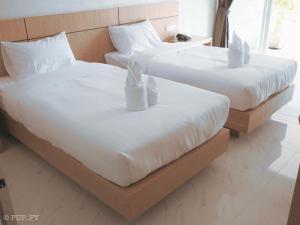 Postel nebo postele na pokoji v ubytování Luxe Villa