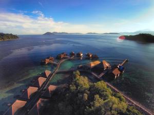 an aerial view of an island in the water at Gayana Marine Resort in Gaya Island