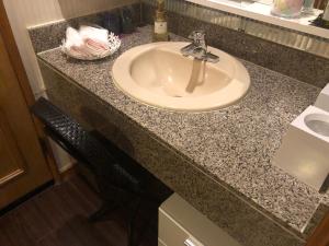 a sink in a bathroom with a counter top at Restay Windy (Adult Only) in Kitakyushu