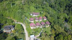 an aerial view of a house on a hill at Tabeak View Point in Ko Yao Noi