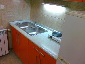 Kuchyň nebo kuchyňský kout v ubytování Hostel M