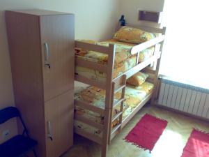 Postel nebo postele na pokoji v ubytování Hostel M