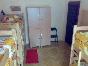 Postel nebo postele na pokoji v ubytování Hostel M