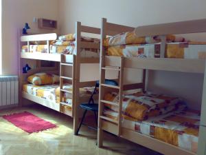 Postel nebo postele na pokoji v ubytování Hostel M