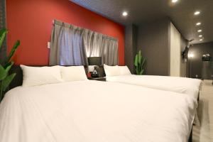 Кровать или кровати в номере ES32 Elizabeth Garden Shinmachi