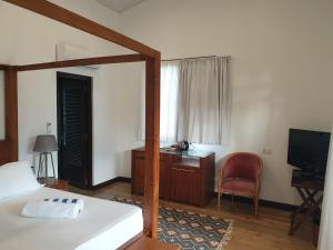 Кровать или кровати в номере Shanti Ghar Guest House