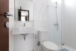 Koupelna v ubytování Jayagiri Guesthouse By Belgareti + 37 fotografií