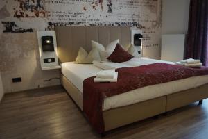 Postel nebo postele na pokoji v ubytování Art Hotel Superior