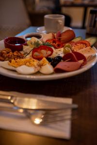 a plate of food on top of a table at New Taksim Hotel in Istanbul