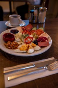 a plate of food on top of a table at New Taksim Hotel in Istanbul