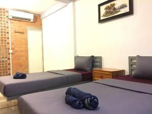 Postel nebo postele na pokoji v ubytování Sevenstars Hostel