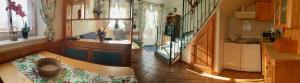 Pokój z przedpokojem ze stołem i umywalką w obiekcie THERMEN - APARTMENT BIODORF Bad Waltersdorf w mieście Bad Waltersdorf