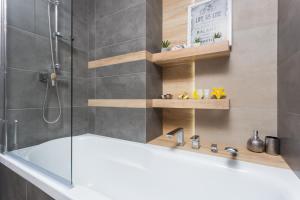 Kúpeľňa v ubytovaní InPoint Spacious Apartments near Main Square & Kazimierz District