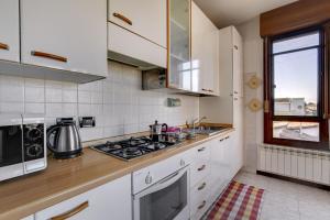 Kuchyň nebo kuchyňský kout v ubytování House Boè