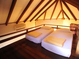 Krevet ili kreveti u jedinici u okviru objekta Redang Paradise Resort