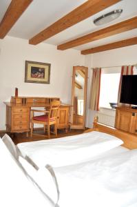 Ein Bett oder Betten in einem Zimmer der Unterkunft Gasthof Schopper