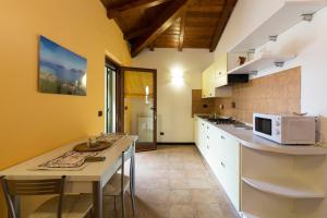 Virtuvė arba virtuvėlė apgyvendinimo įstaigoje Residence Montebello