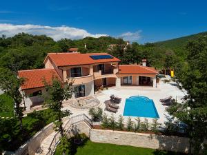 an aerial view of a house with a swimming pool at Villa Antonija in Labin