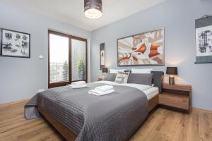 Posteľ alebo postele v izbe v ubytovaní InPoint Spacious Apartments near Main Square & Kazimierz District