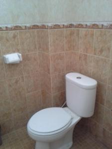 Ett badrum på Pica Sedana Homestay