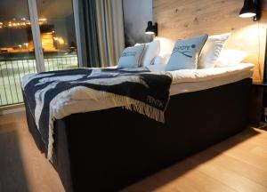 Postelja oz. postelje v sobi nastanitve KIDE hotel by Iso-Syöte