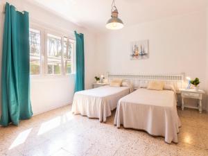Posteľ alebo postele v izbe v ubytovaní Holiday Home Villa Karoline by Interhome