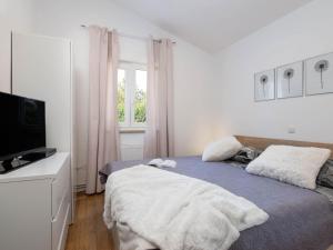 Postel nebo postele na pokoji v ubytování Holiday Home Casetta Filip by Interhome