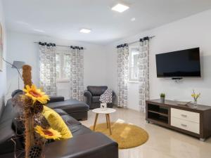 TV a/nebo společenská místnost v ubytování Holiday Home Casetta Filip by Interhome