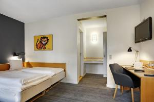 Postelja oz. postelje v sobi nastanitve Hotel Garni