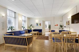 Predel za sedenje v nastanitvi Hotel Garni
