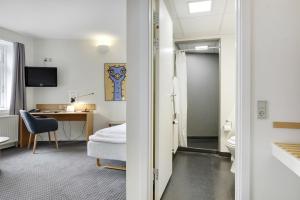 Postelja oz. postelje v sobi nastanitve Hotel Garni