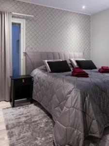Ένα ή περισσότερα κρεβάτια σε δωμάτιο στο Luxury suites Pannunkorva D