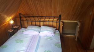 Postel nebo postele na pokoji v ubytování Peahen Residence
