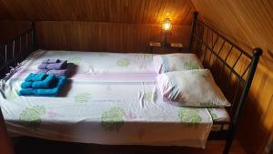 Postel nebo postele na pokoji v ubytování Peahen Residence
