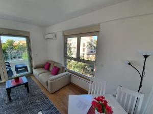 Posezení v ubytování AS Apartments Rafailovici
