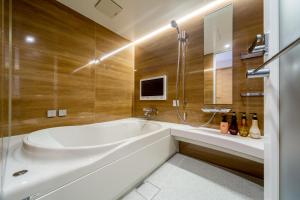 
Salle de bains dans l'établissement Hotel & Resort Bali Tower Tennoji
