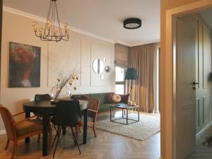 Posedenie v ubytovaní Apartament 53 Długie Ogrody Gdańsk