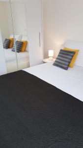 Postel nebo postele na pokoji v ubytování Apartments4friends Apartment VLAD